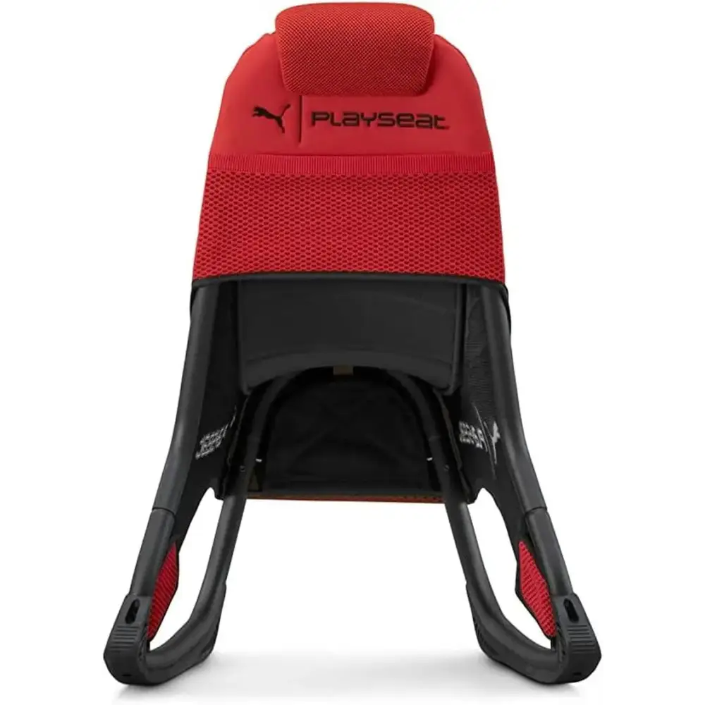 Red and black puma playseat baby carrier with mesh fabric and plastic frame.