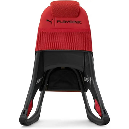 Red and black puma playseat baby carrier with mesh fabric and plastic frame.