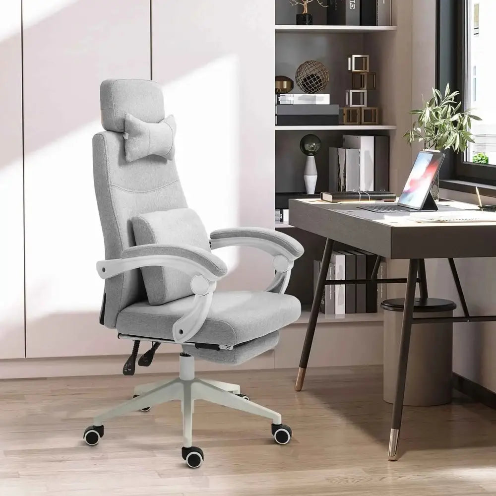 Gray upholstered ergonomic office chair with adjustable headrest and armrests, featuring a five-star base with casters.