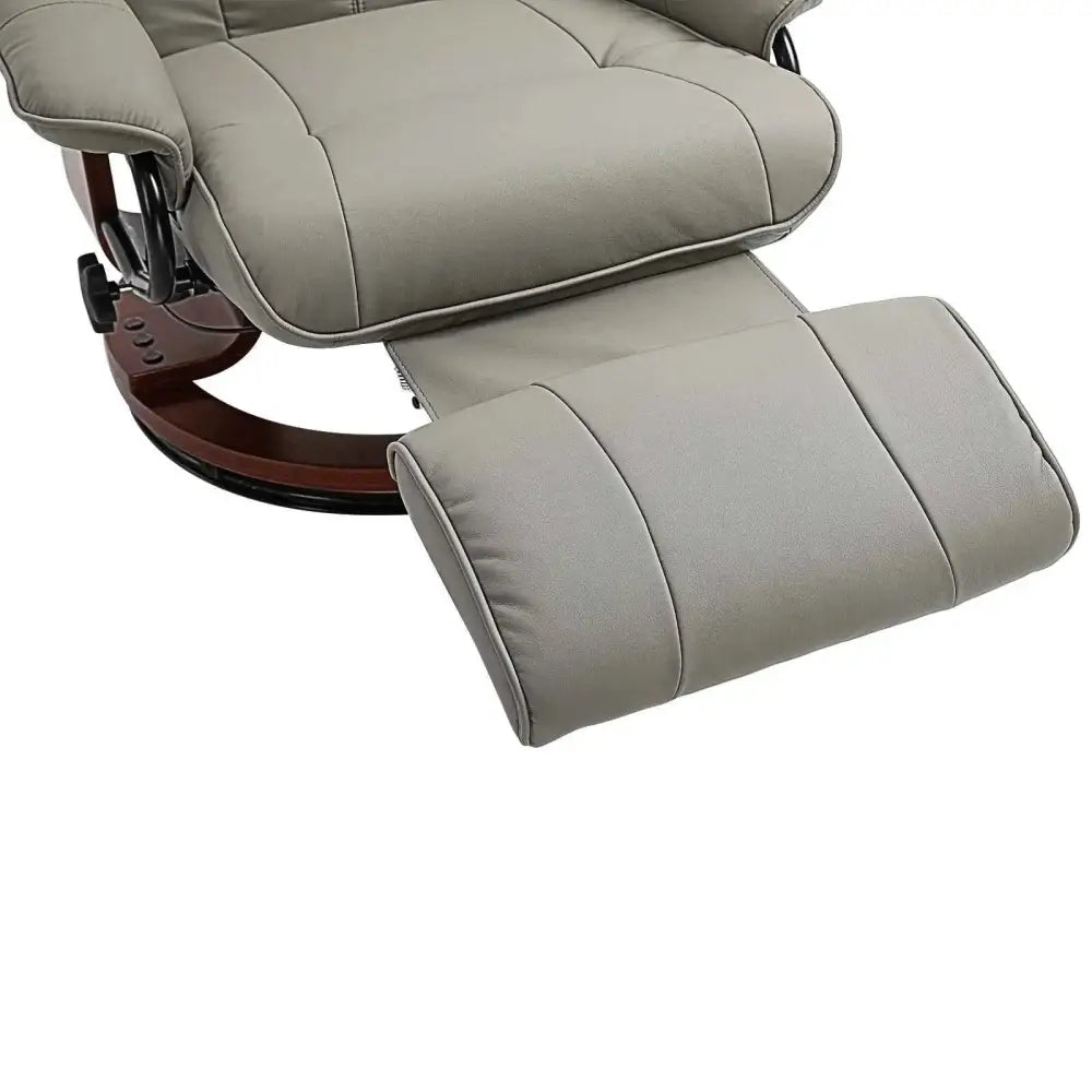 Beige leather recliner with a matching footrest and dark wood base.